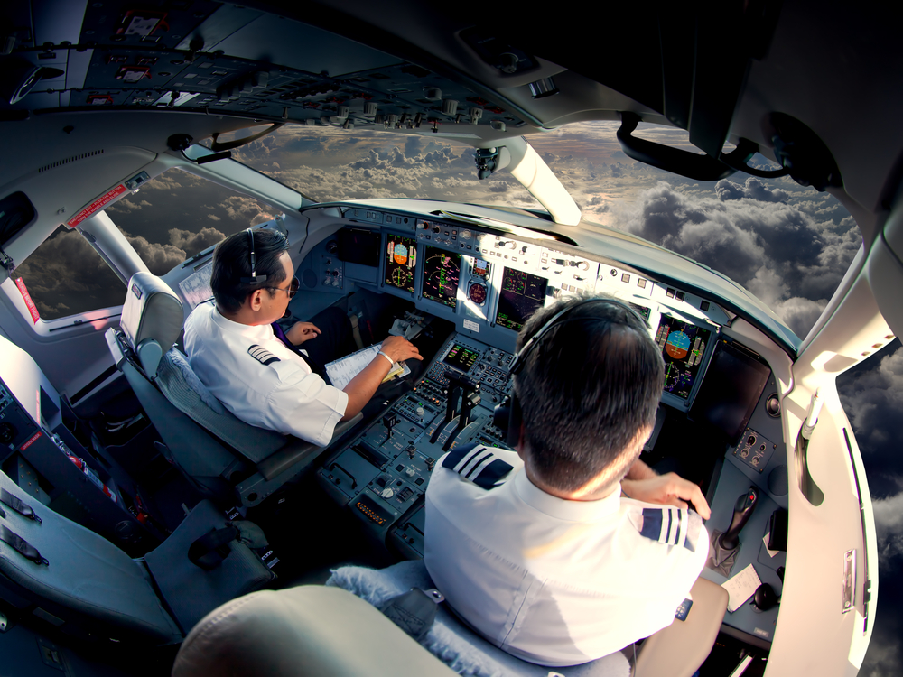 pilots in a flight deck